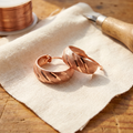 Koperen oorbellen – Vallei