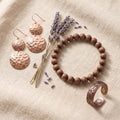 Set van drie koperen sieraden